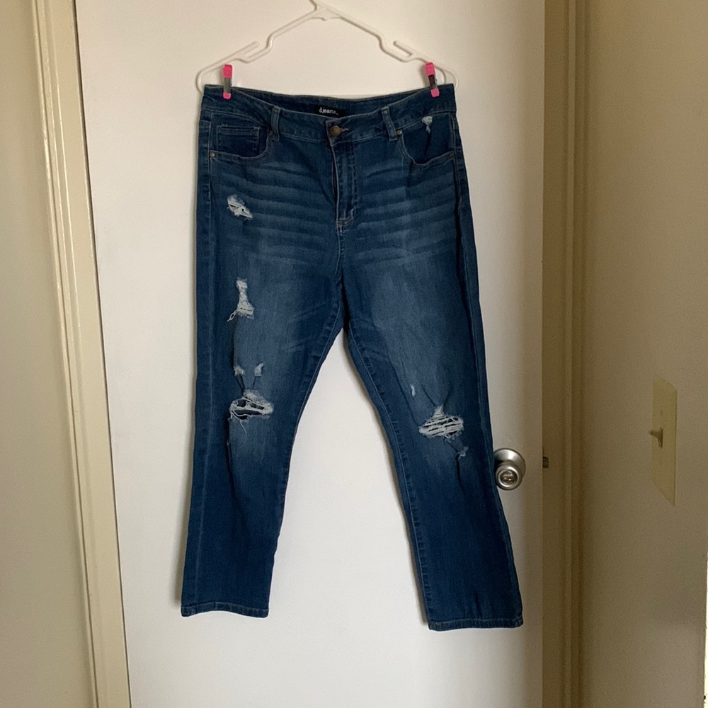 Dark blue jeans with slight rips